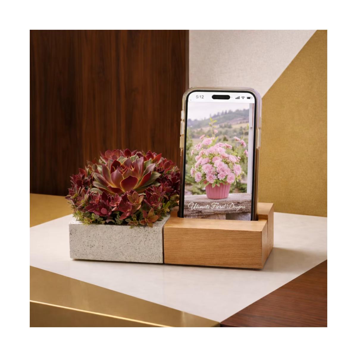 Modern succulent arrangement with rich burgundy and green tones in a sculptural vessel. A lasting, elegant design perfect for any space. Same-day delivery in Great Falls, McLean, Vienna, Reston, Arlington & DC.