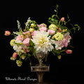 Preserved Floral arrangement with white, pink, and green flowers in a decorative vase. Ultimate Floral Designs, Great Falls, VA