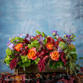 rectangular arrangement with jasmine vine, hydrangea , orchids, freesia, viburnum-ultimate floral designs Great Falls Va