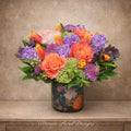 Coral Free Spirit roses, tulips, and hyacinths in a clear glass vase — same-day flower delivery by Ultimate Floral Designs
