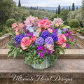 Garden roses, spray roses, lavender hyacinths, and orchids in a lush dome arrangement — Ultimate Floral Designs, Great Falls, VA
